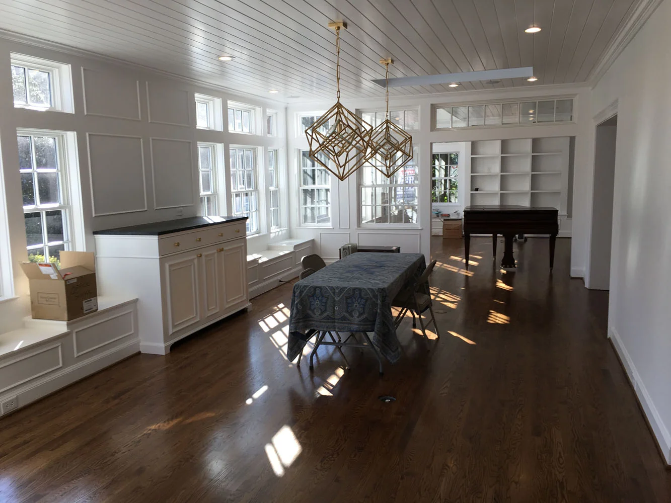 Dining area with gold chandelier