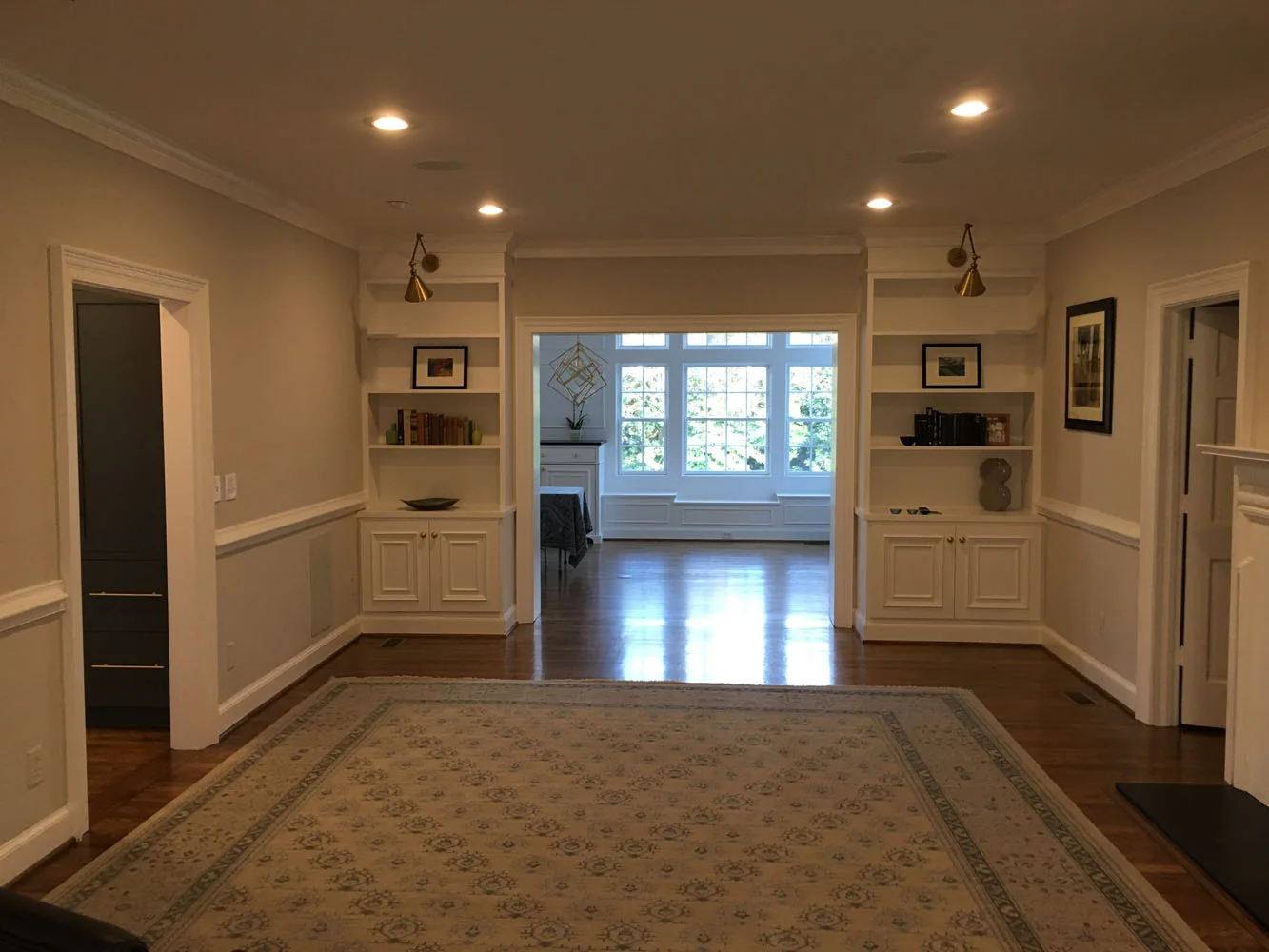 Open living room with built-in cabinets